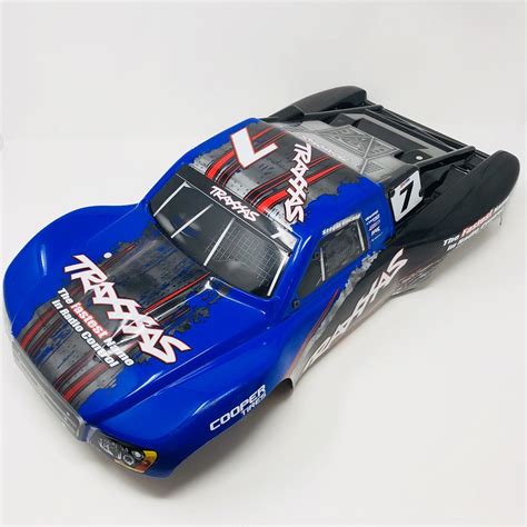 Traxxas slash 4x4 body shell - Features. 30+ MPH capable*. Titan 12-Turn 550 brushed motor w/ in-built fan. Waterproof XL-5 ESC. Traxxas TQ 2.4Ghz radio. Includes Traxxas 4-amp Peak detecting fast charger. Waterproof electronics. *with included optional 23-tooth pinion gear & …